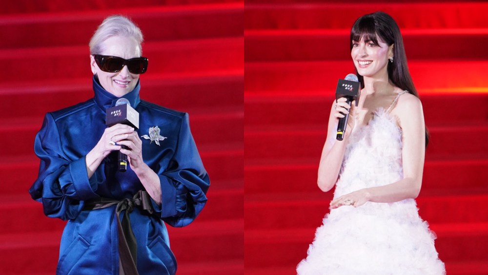Meryl Streep in Saint Laurent, left, and Anne Hathaway in Susan Fang at the premiere of film "The Devil Wears Prada 2" on April 10 in Shanghai, China.