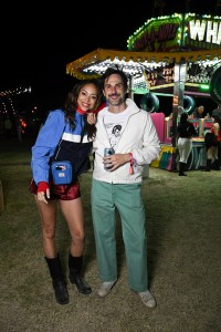 Amber Stevens West and Andrew J. West at Neon Carnival 2026 on April 11, 2026 in Thermal, California.