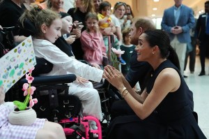 MELBOURNE, AUSTRALIA - APRIL 14: Meghan, Duchess of Sussex and Prince Harry, Duke of Sussex meet patients and their families on a visit to the Royal Children's Hospital on April 14, 2026 in Melbourne, Australia. The royal couple are on a four-day visit to Australia, with engagements across Melbourne, Canberra and Sydney. (Photo by Jonathan Brady-Pool/Getty Images)