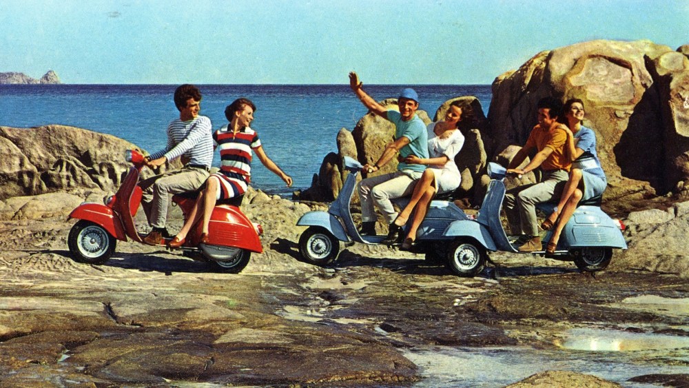 A photograph from the “80 Years of Vespa” exhibition to bow in Rome.