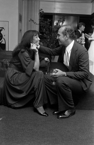 China Machado and Oscar de la Renta attend a party celebrating Carrie Donovan's promotion to VP of communications for Bloomingdale's, at Calvin Klein's apartment in New York City on May 4, 1976.