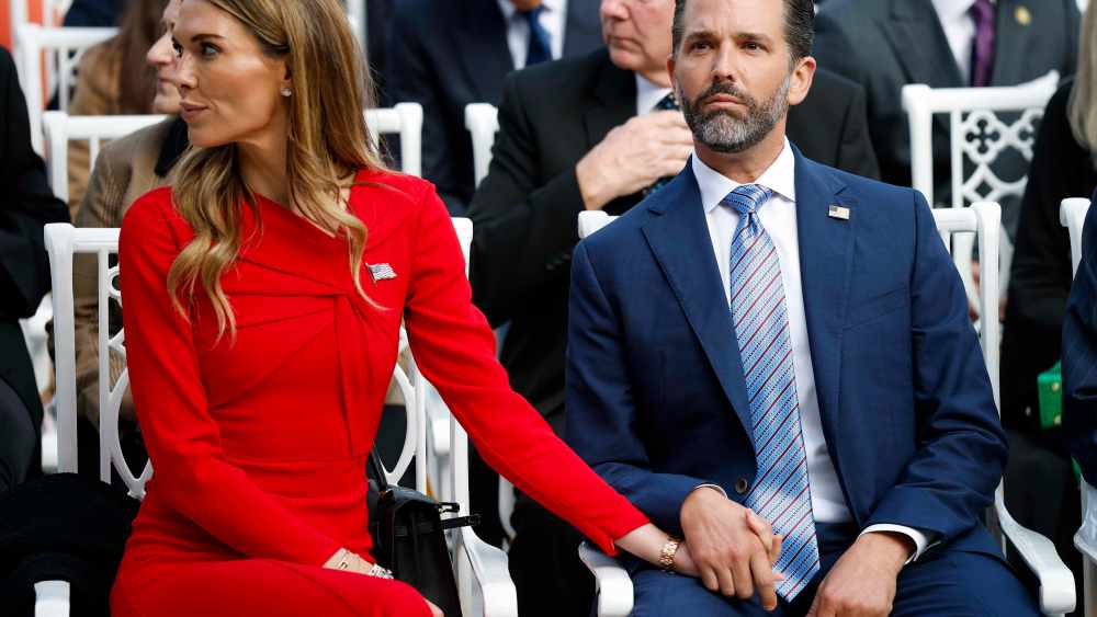 WASHINGTON, DC - OCTOBER 14: Donald Trump Jr. (R) sits with his girlfriend Bettina Anderson prior to a Presidential Medal of Freedom ceremony in the Rose Garden of the White House on October 14, 2025 in Washington, DC. Today marks the National Day of Remembrance for Charlie Kirk who was shot and killed on September 10th at Utah Valley University. (Photo by Kevin Dietsch/Getty Images)