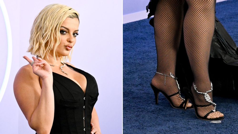 Bebe Rexha wears a pair of Scorpion Heels, likely Vicini by Giuseppe Zanotti, at the 2026 American Music Awards Red Carpet.