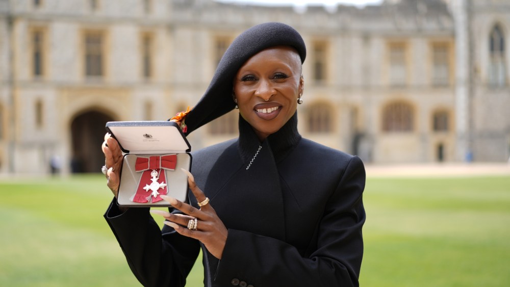 Cynthia Erivo wears Givenchy by Sarah Burton to be made a Member of the Order of the British Empire (MBE) by the Prince of Wales at an investiture ceremony at Windsor Castle on May 19 in Windsor, England.