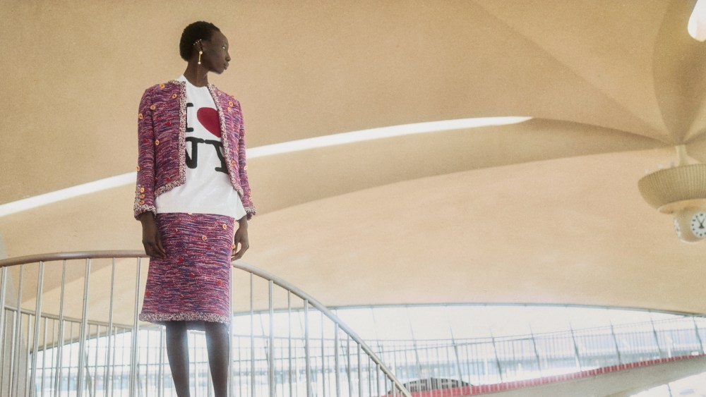 Chanel tweed jacket, silk jersey top, tweed skirt, goatskin slingbacks and metal resin earrings